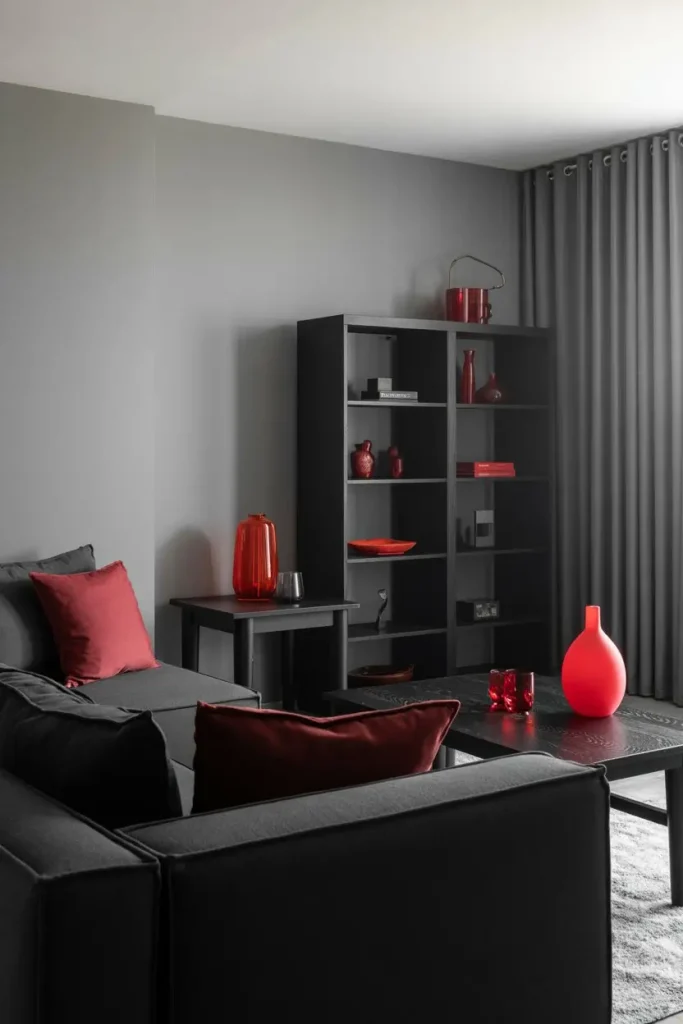 Bold Black Furniture Anchored with Red Accessories