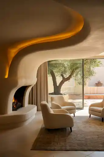 Curved Two-Story Fireplace for Soft Elegance