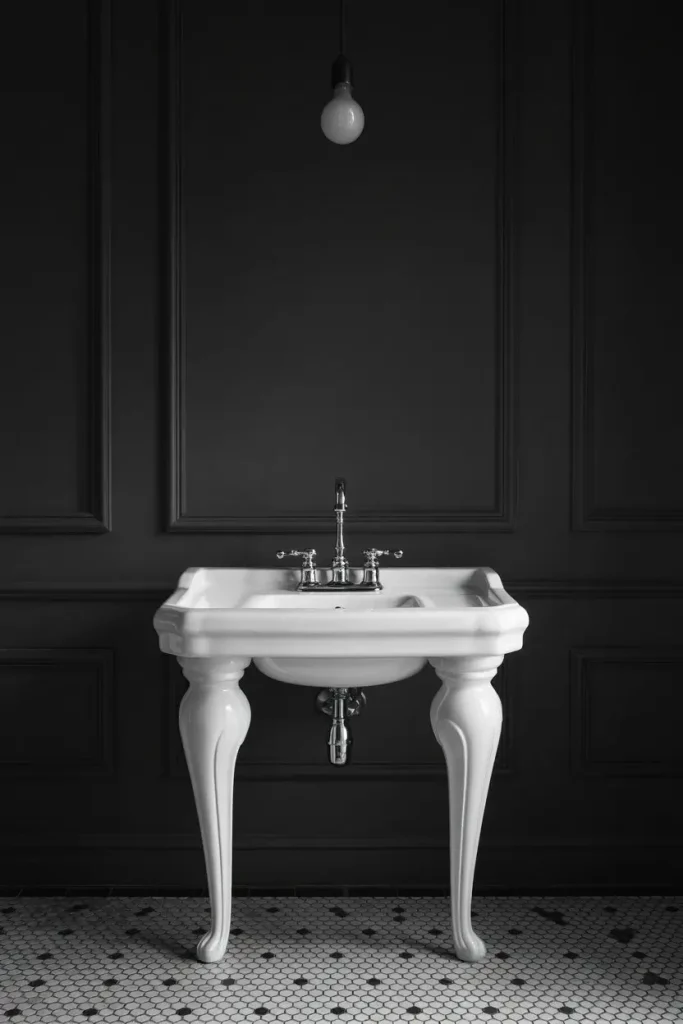 Pedestal Sink with Black-and-White Theme